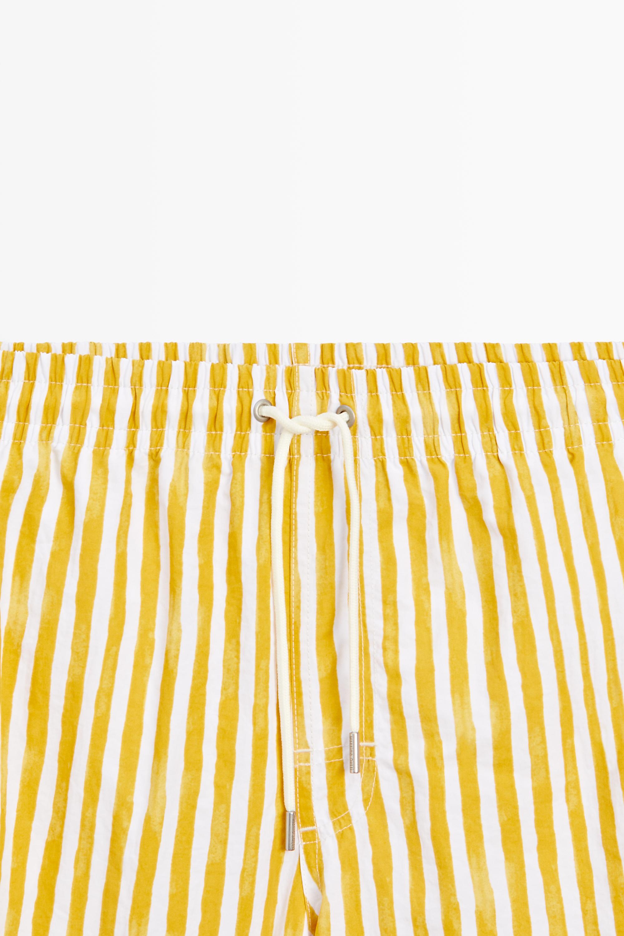 Striped printed swimming trunks Yellow
