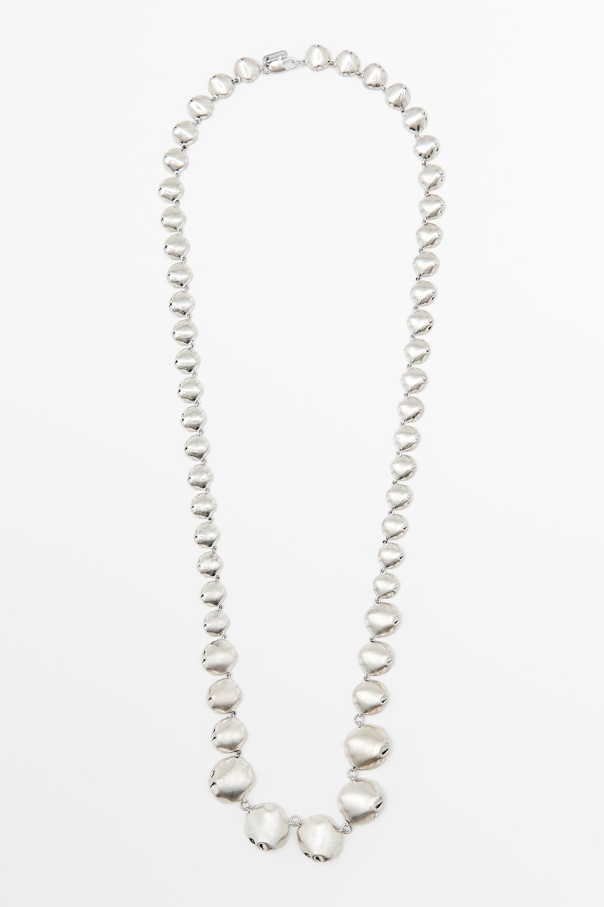 Long necklace with metal pieces Silver