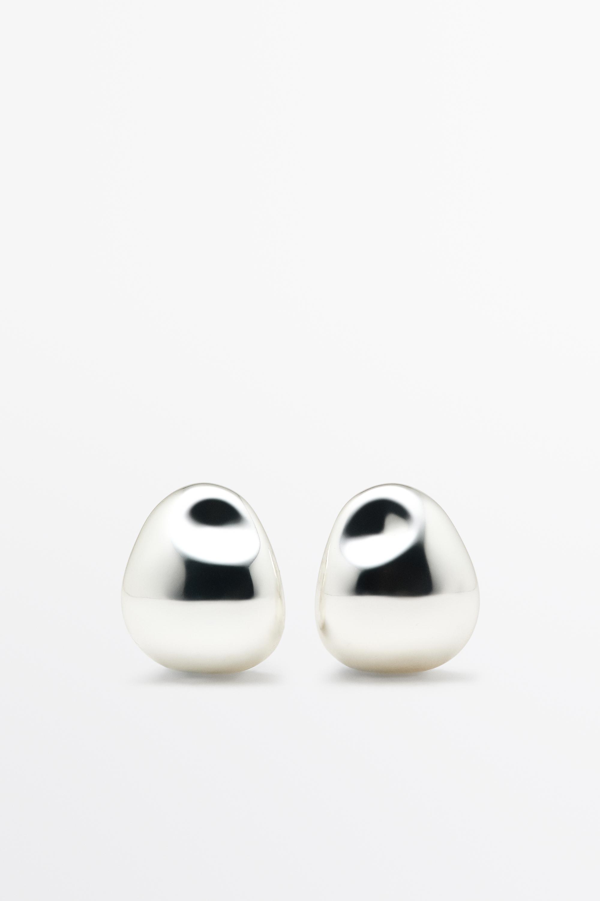 Curved pebble earrings Silver