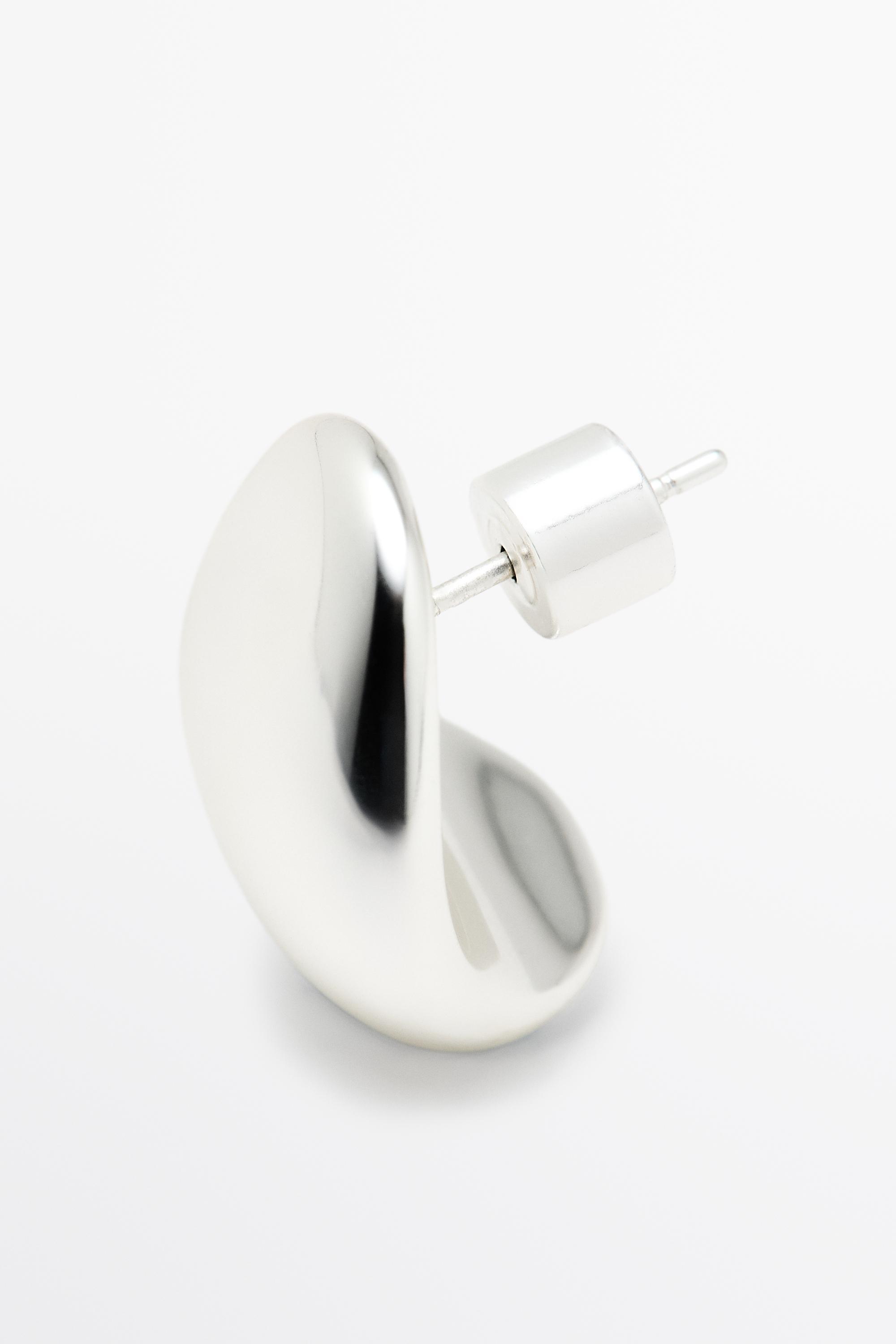 Curved pebble earrings Silver