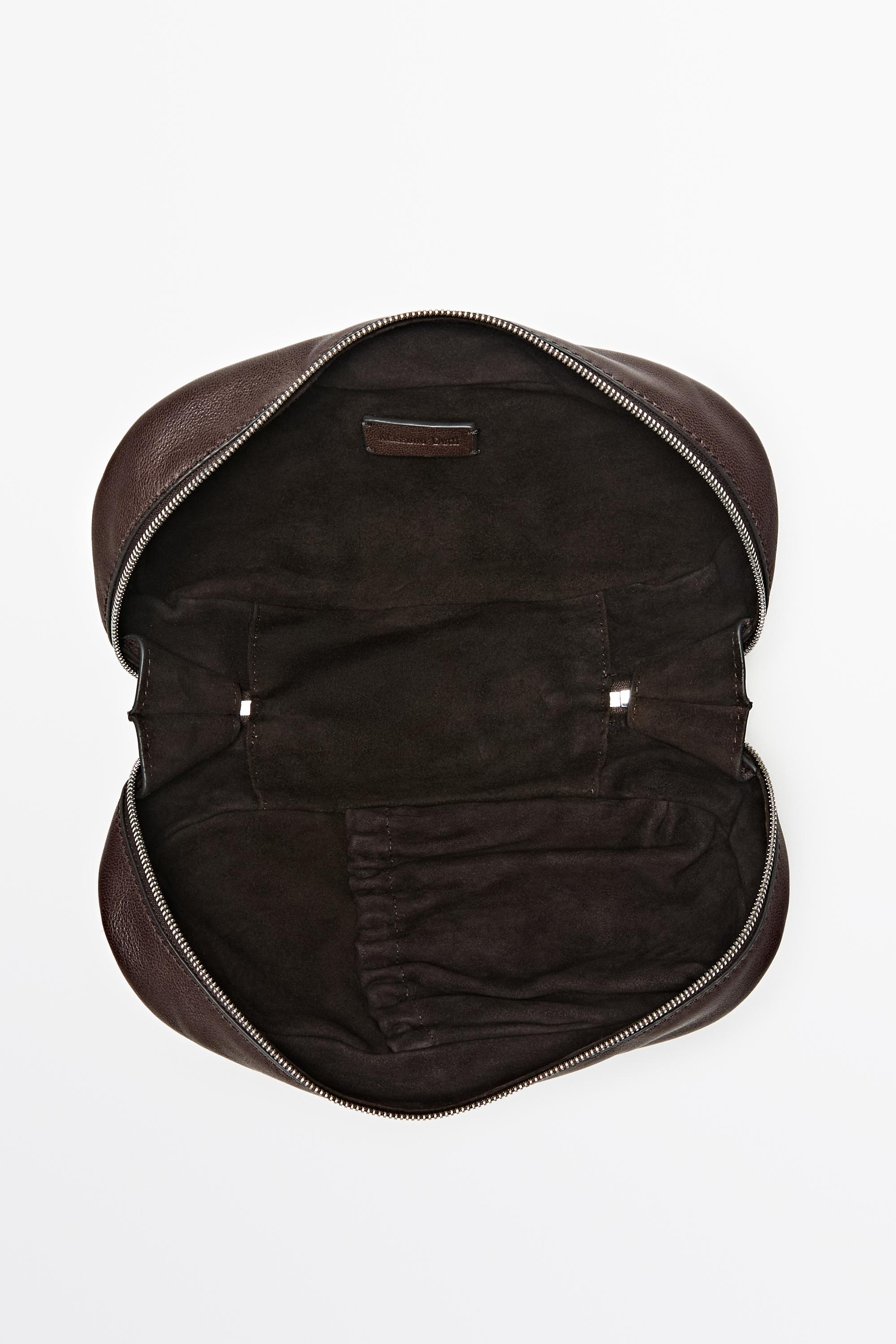 Nappa leather oval toiletry bag Brown