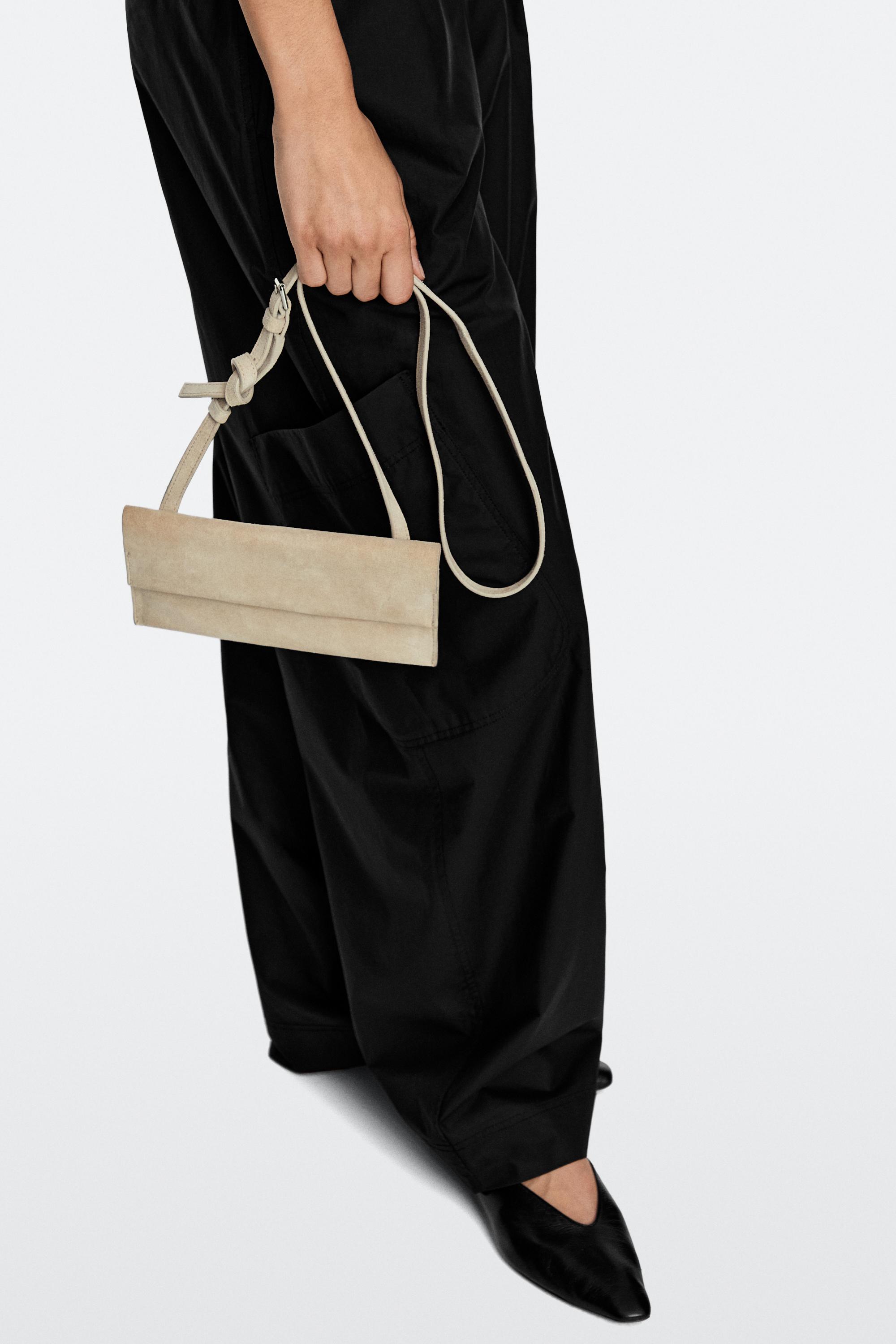 Suede leather shoulder bag Ecru