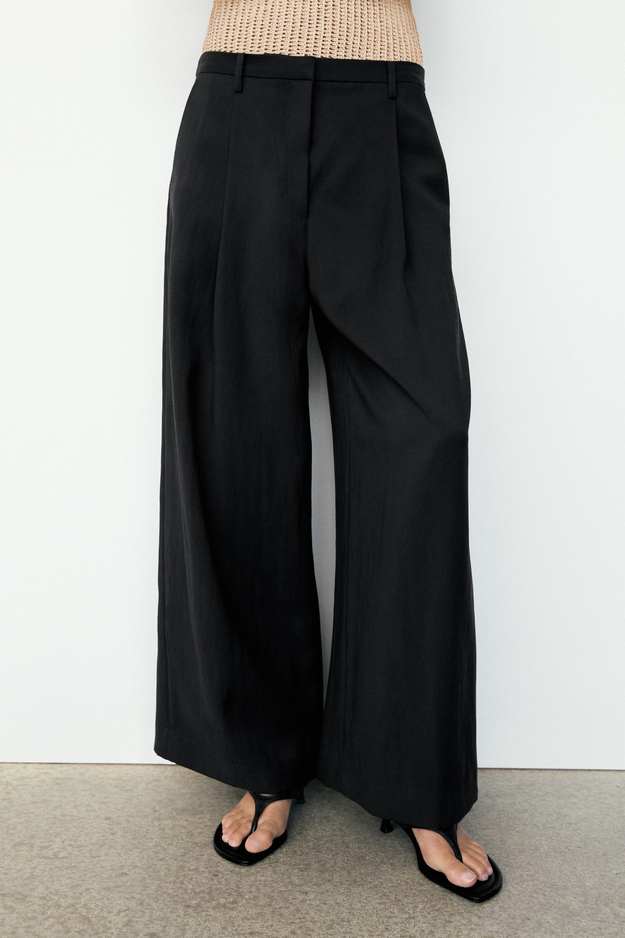 Flowing cropped wide-leg pants Black