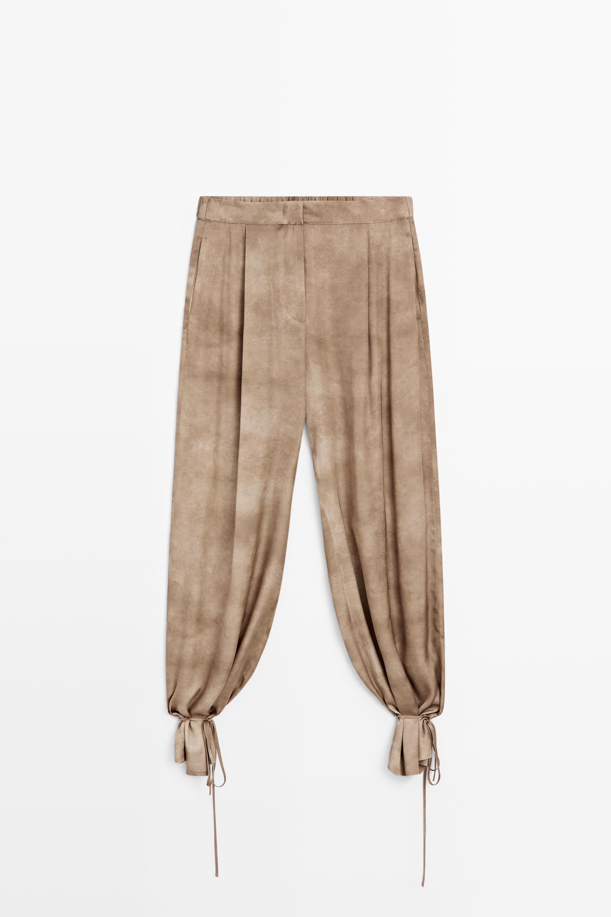 Flowing pants with tie-detail hem Beige