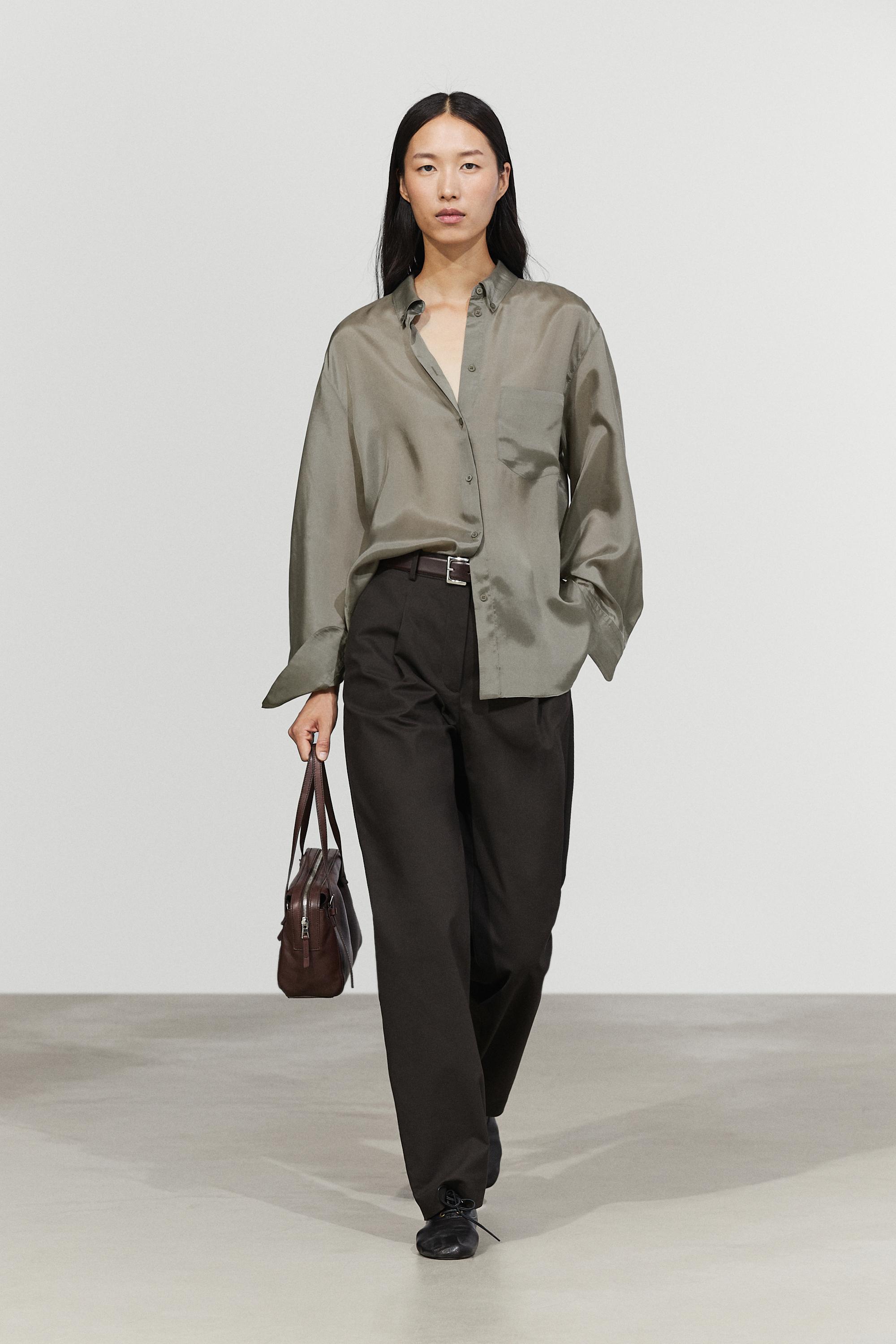 Pleated cotton-blend pants Black
