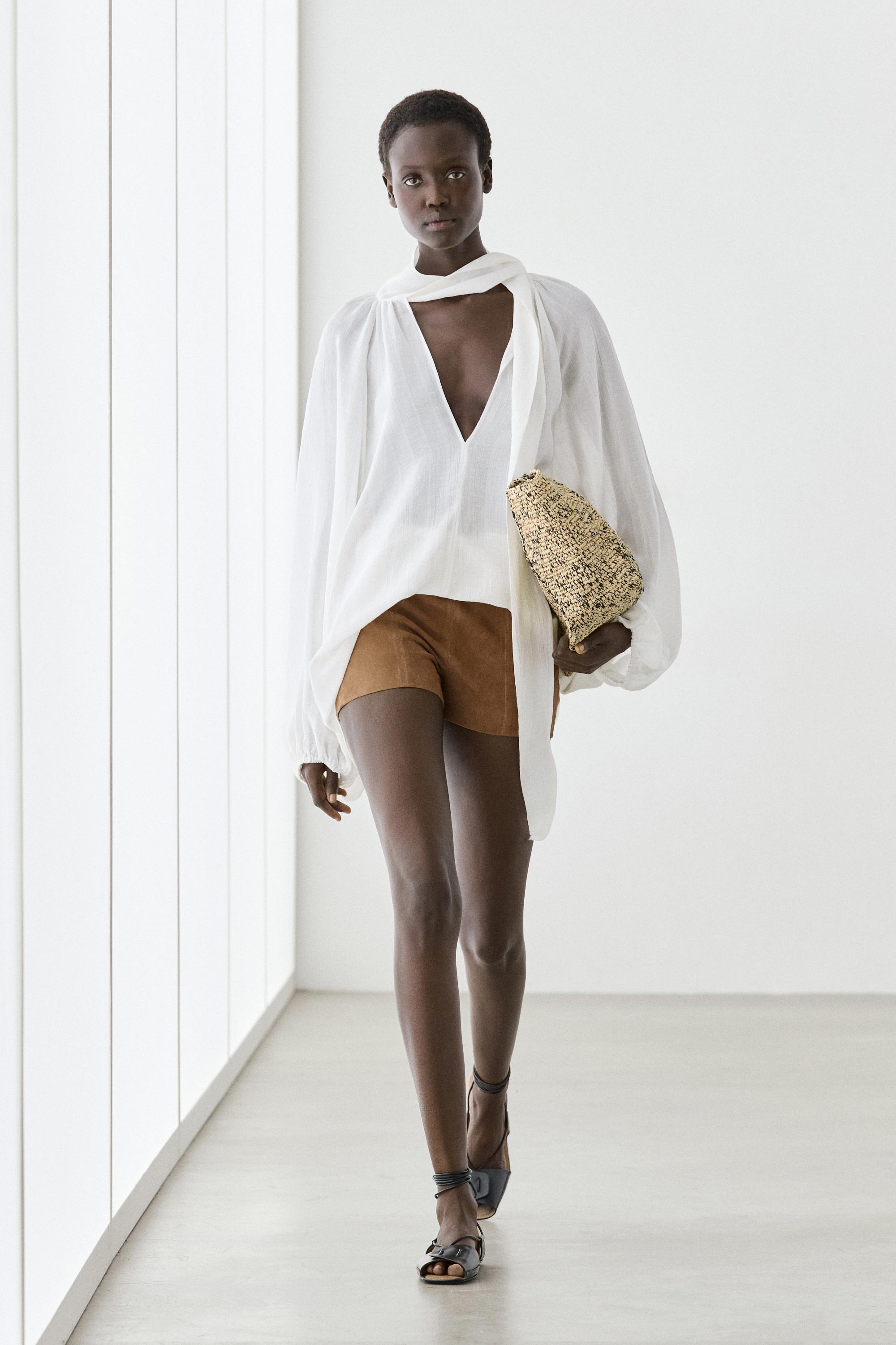 Flowing V-neck blouse with tie White