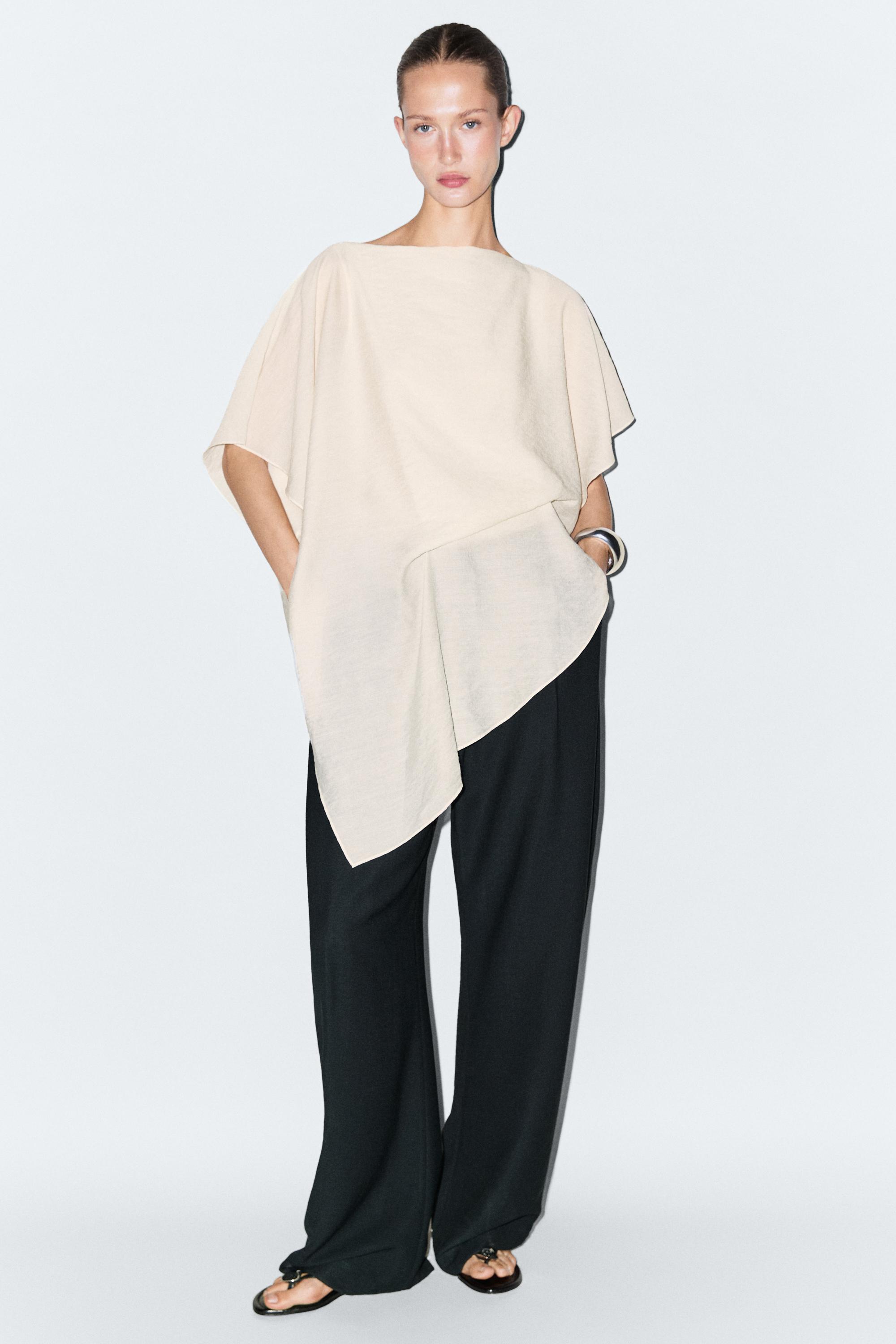 Asymmetric cape-style flowing blouse Off White