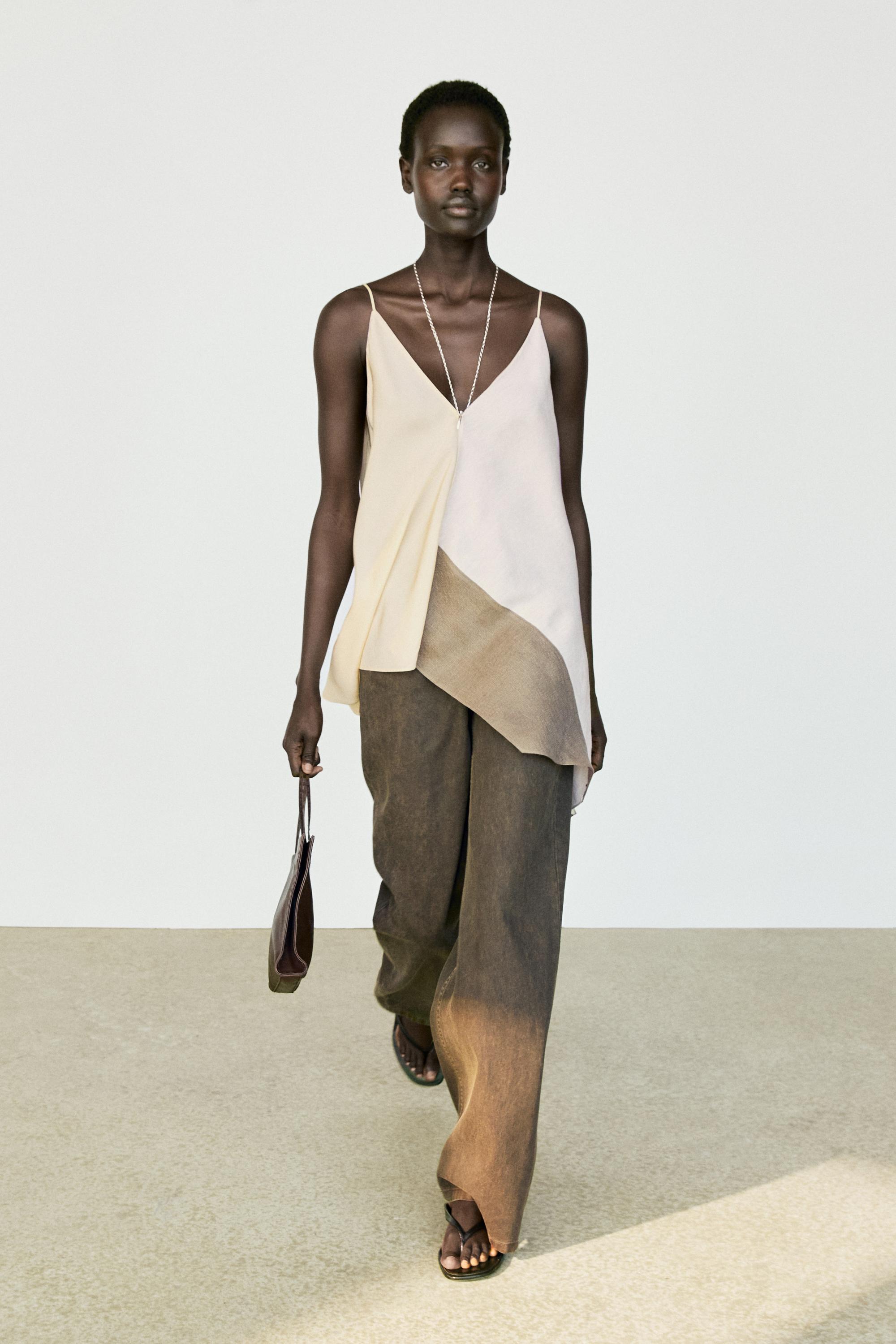 Asymmetric strappy flowing top Cream