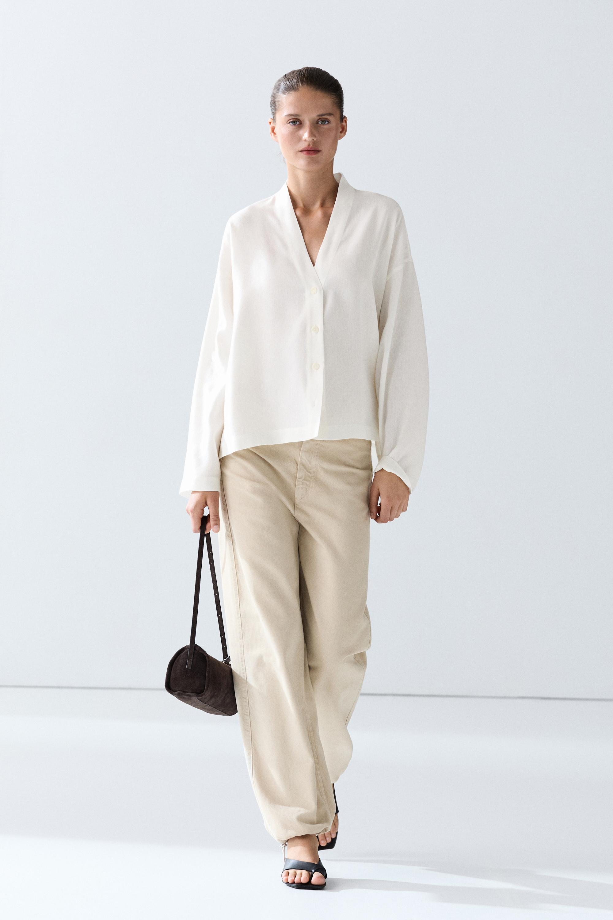 Flowing linen-blend V-neck shirt White