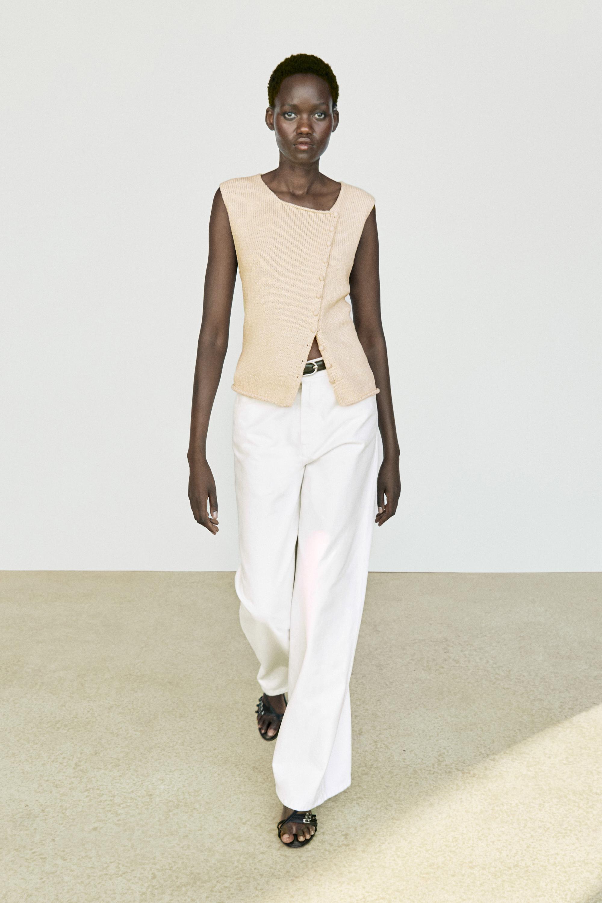 Cotton blend knit top with button detail Cream