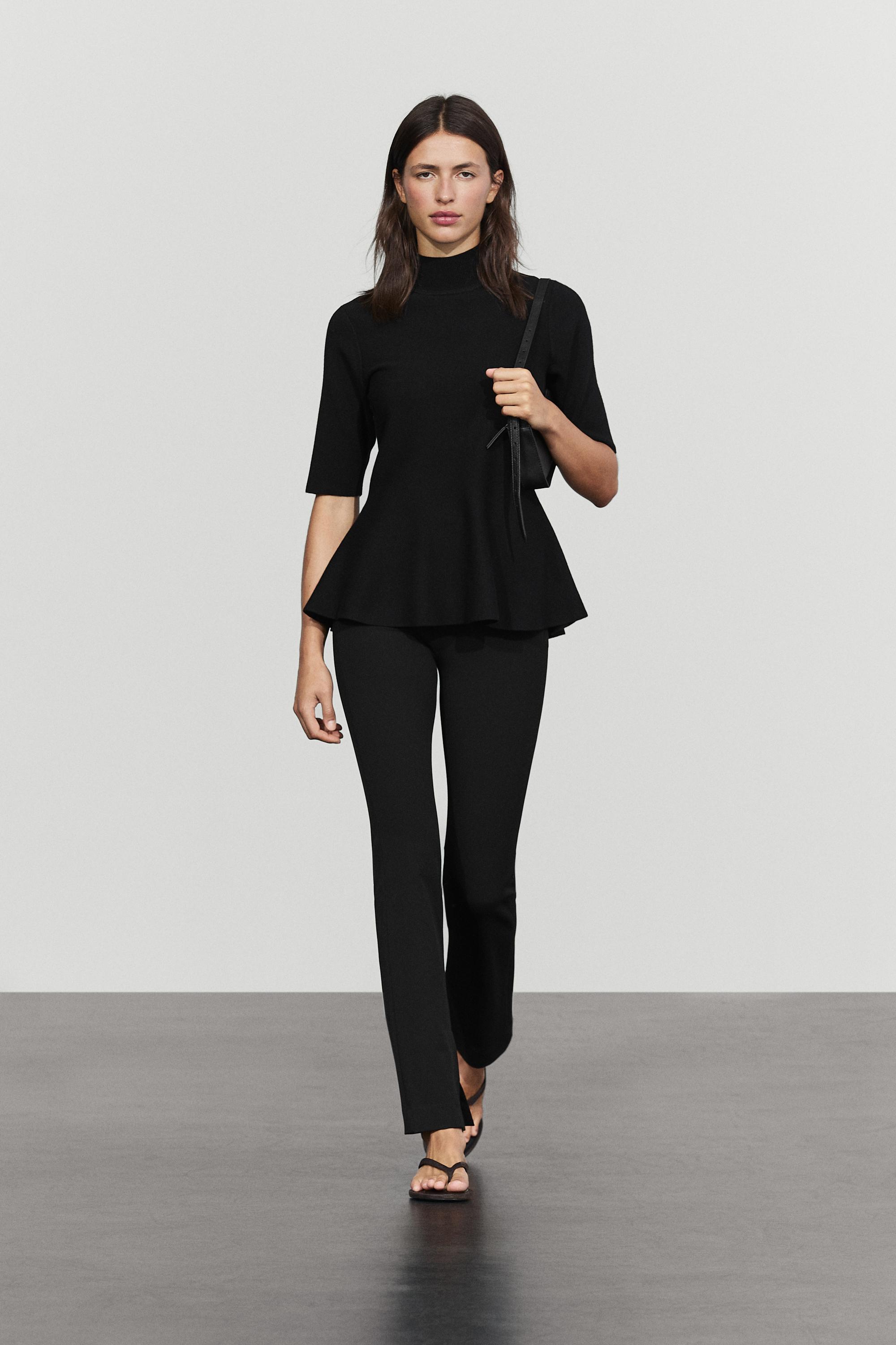 Peplum detail knit top Black