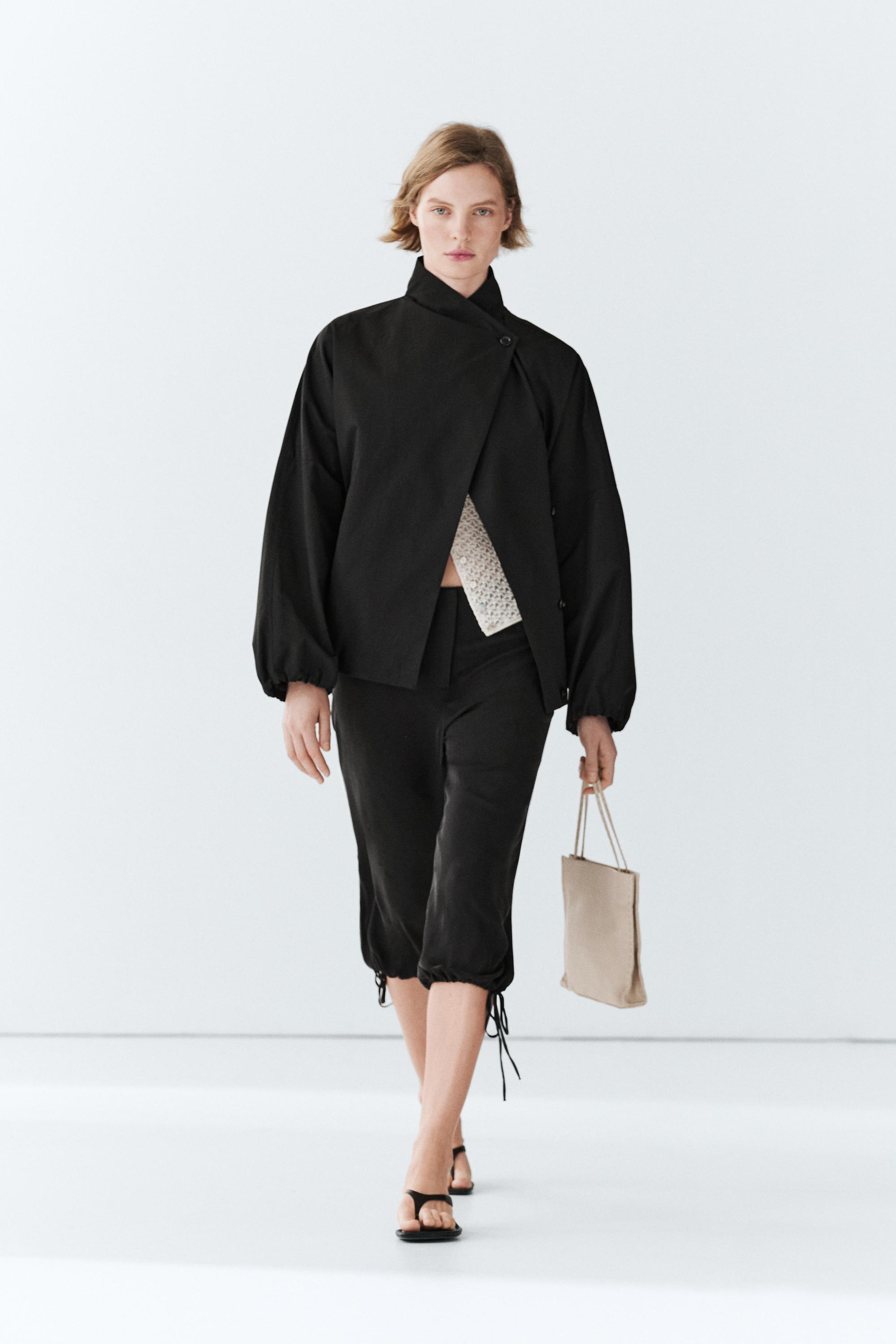 Technical bomber jacket with side button Black