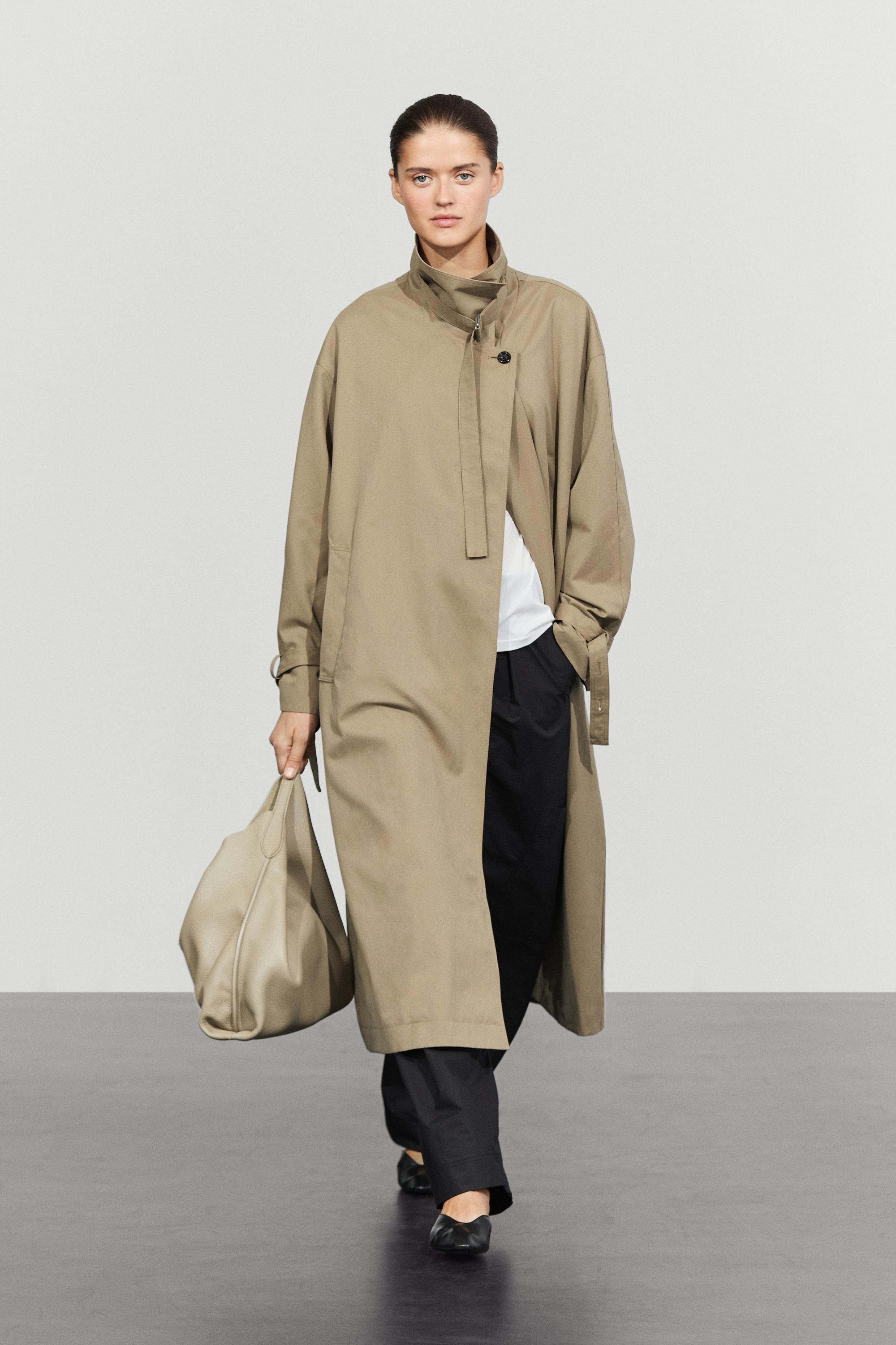 Long trench coat with buckle detail Beige