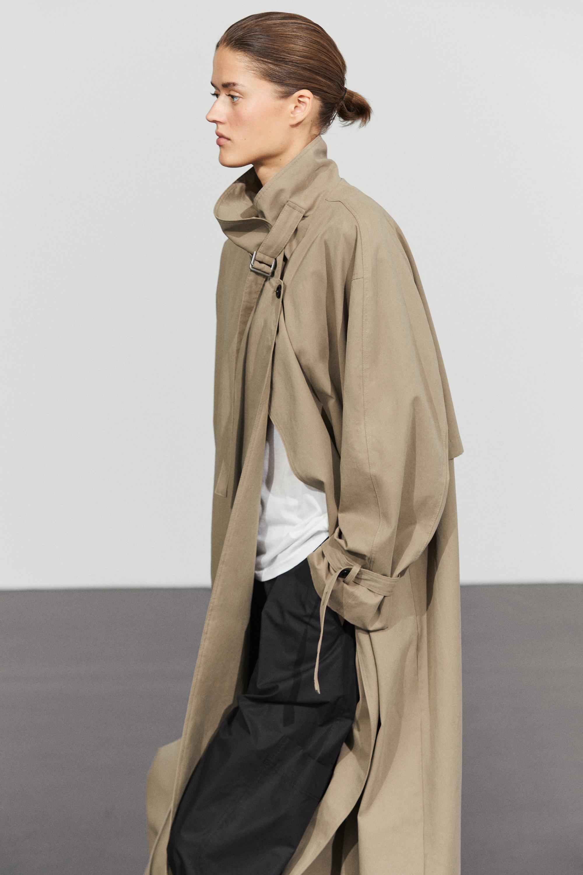 Long trench coat with buckle detail Beige