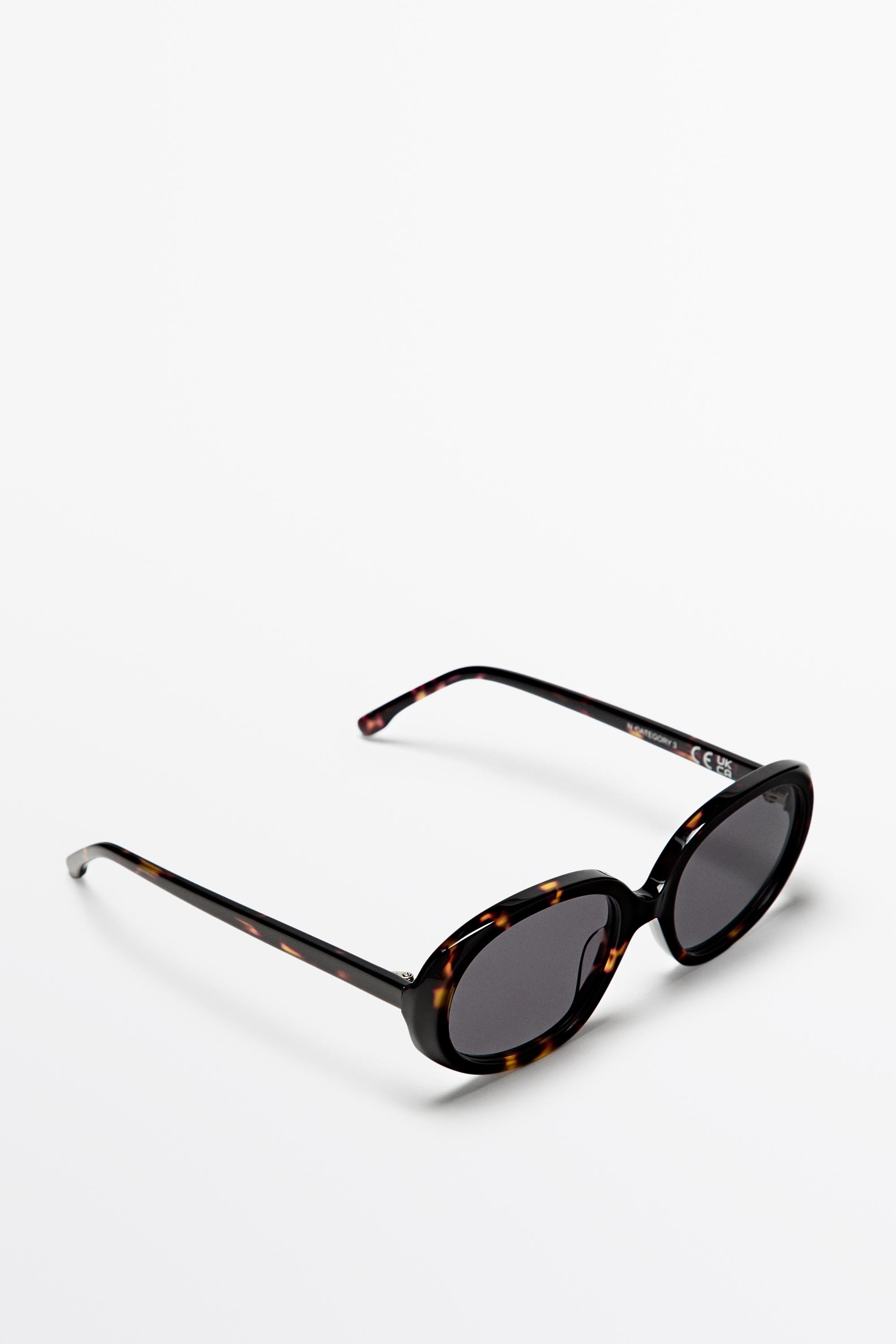Oval tortoiseshell-effect sunglasses Brown