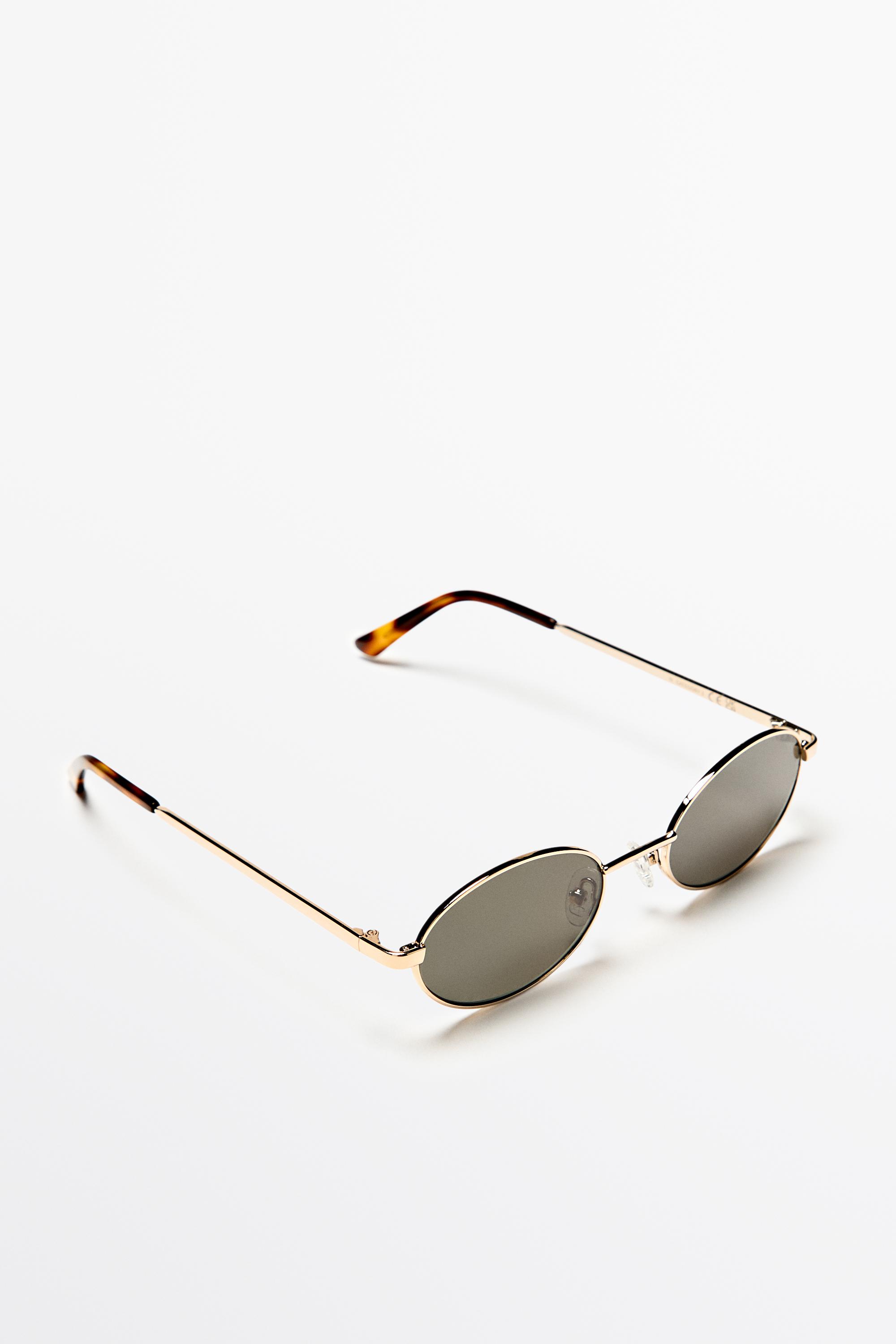 Oval metal sunglasses Golden